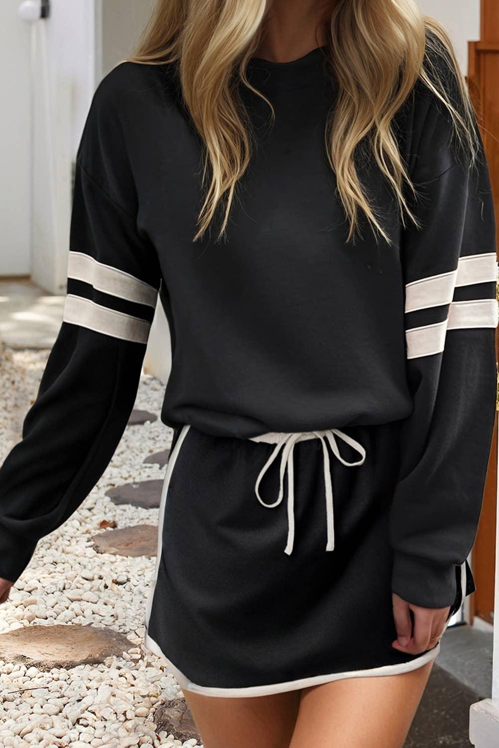 Black long sleeve sweatshirt with white stripe sleeves and matching drawstring shorts, casual athleisure outfit