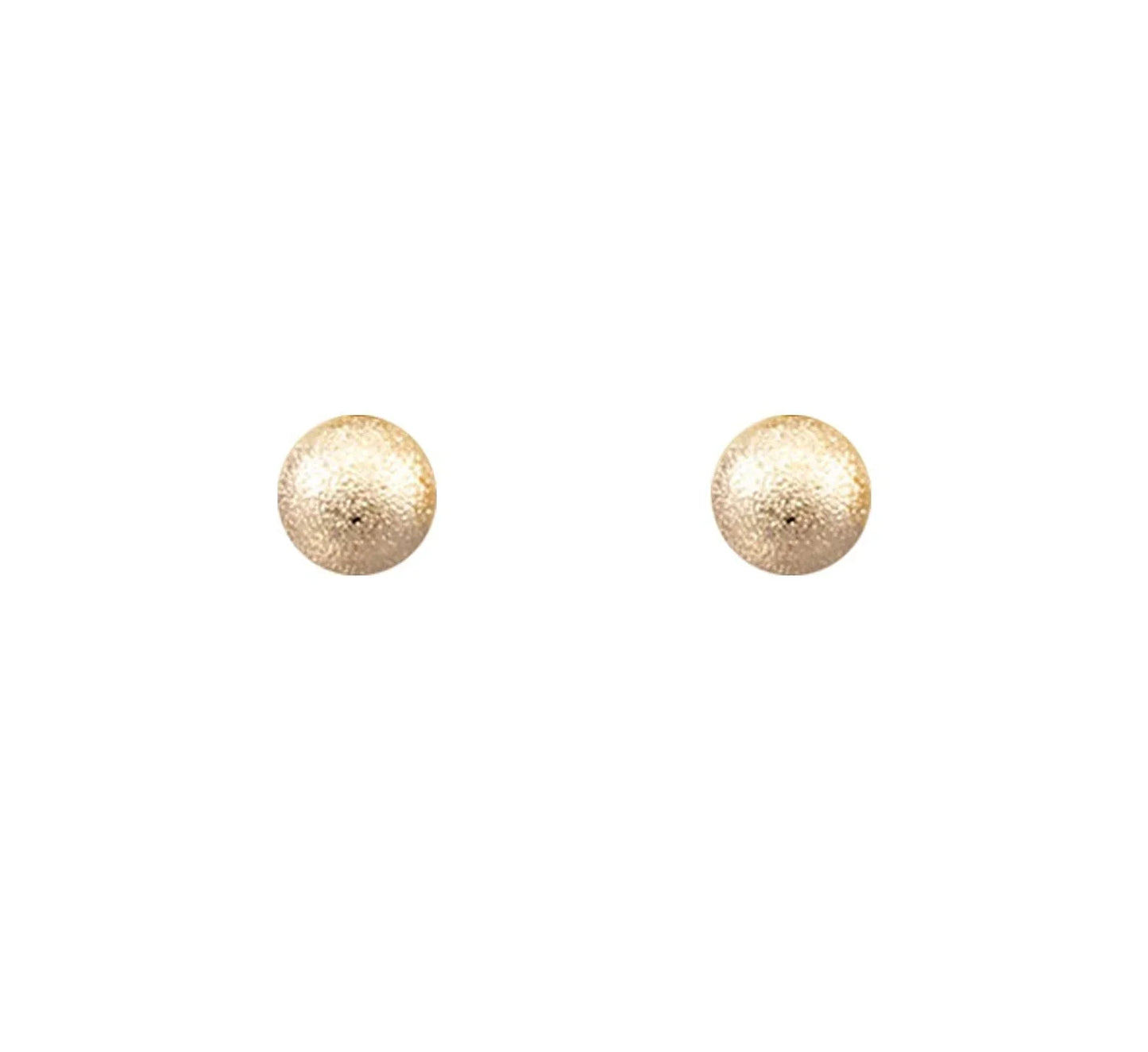 Textured gold ball stud earrings on white background