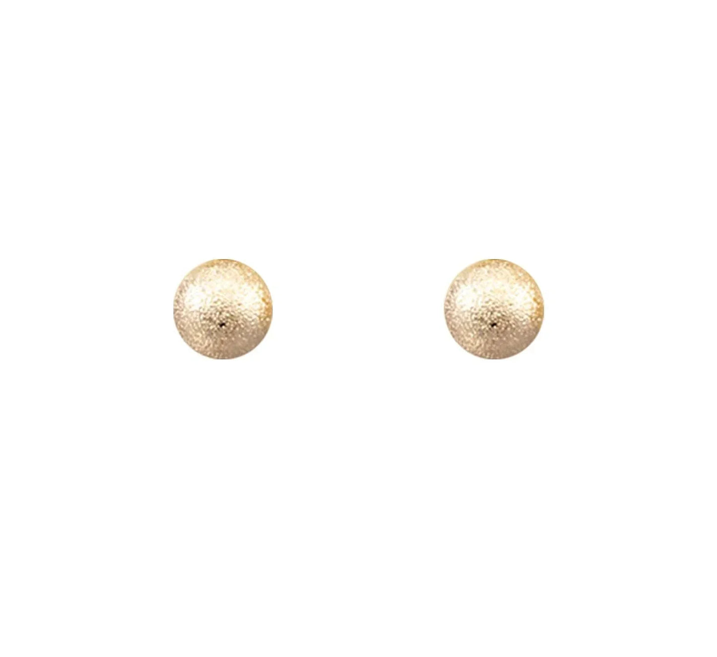 Textured gold ball stud earrings on white background