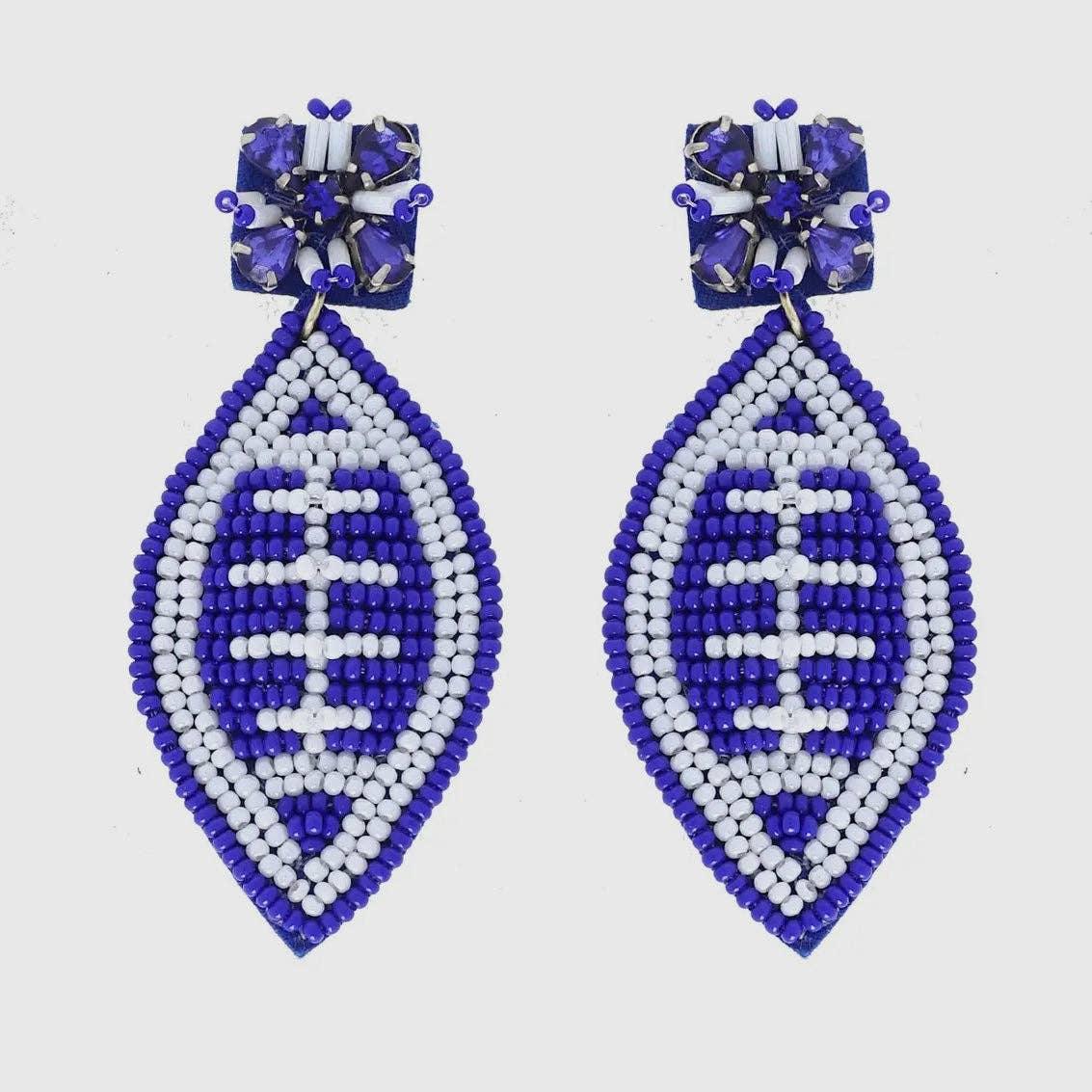 Purple and white beaded drop earrings with floral crystal accents, boho fashion accessory