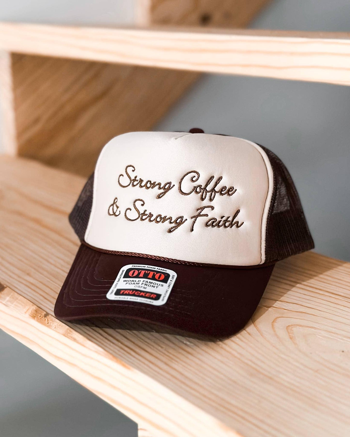 Brown and white trucker hat with 'Strong Coffee & Strong Faith' embroidered on front