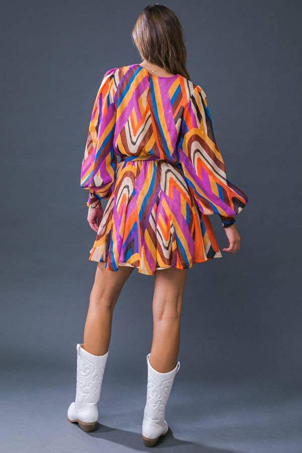 Colorful zigzag pattern mini dress with white cowboy boots