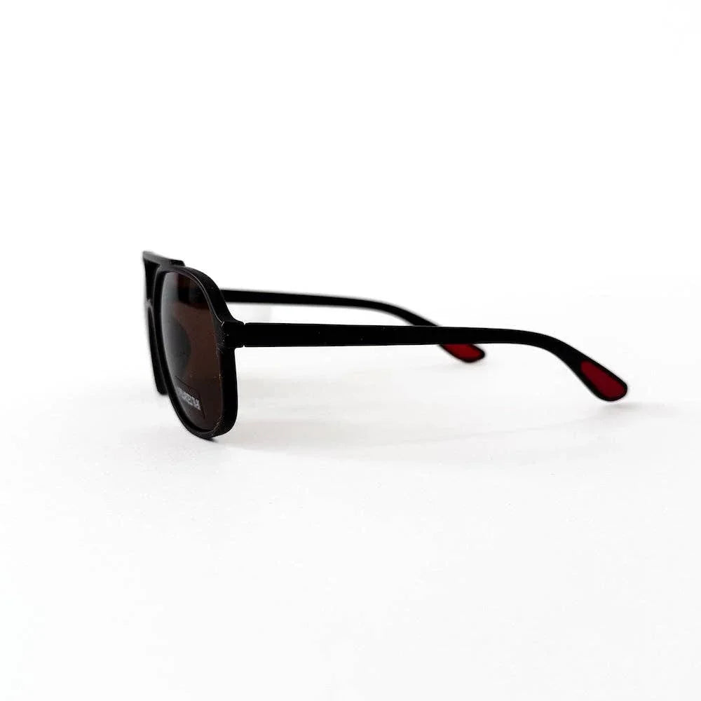 Black rectangular sunglasses with red temple tips, stylish accessory for fashion-forward looks