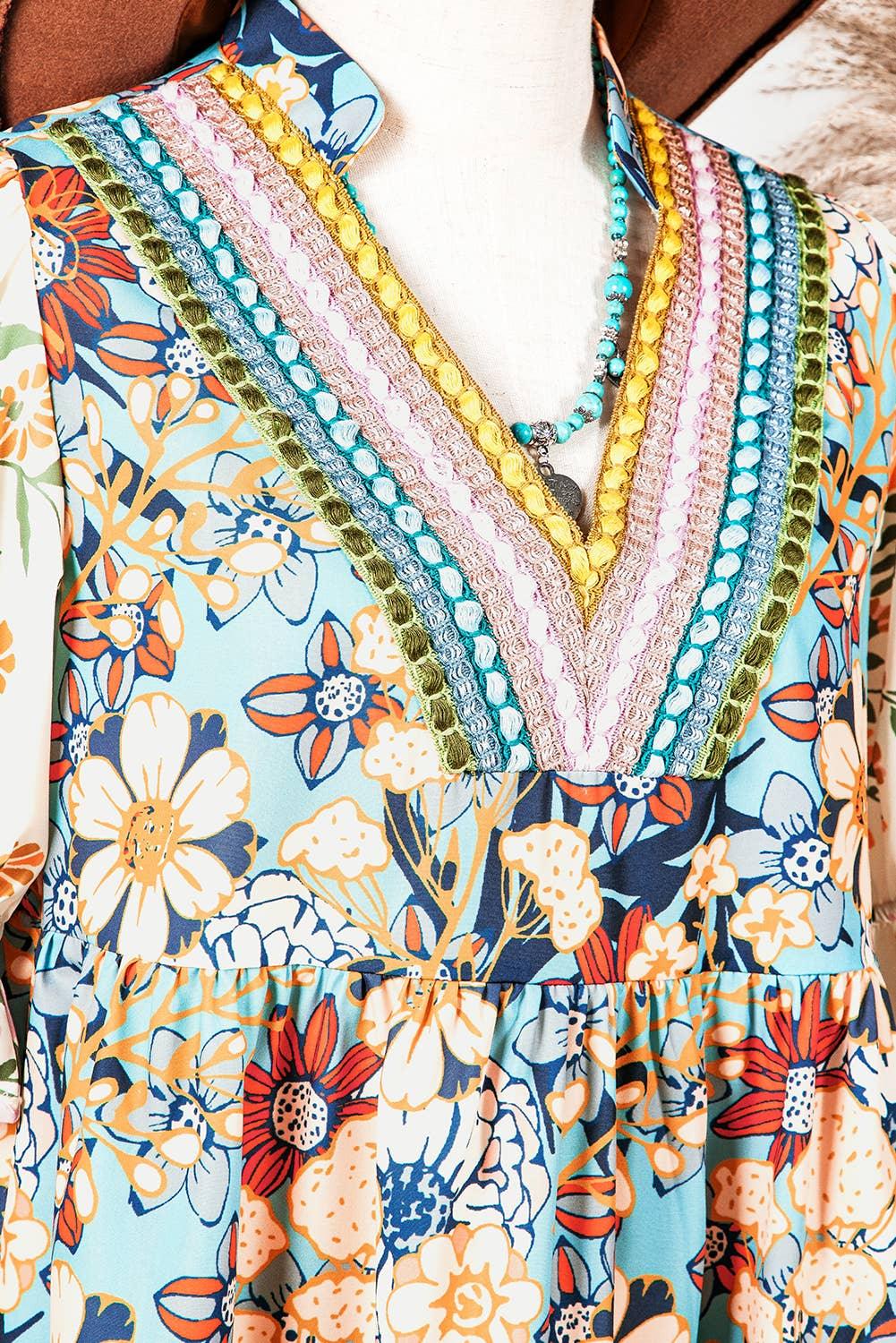 Boho floral dress with colorful embroidered V-neck, perfect for summer fashion and boutique style