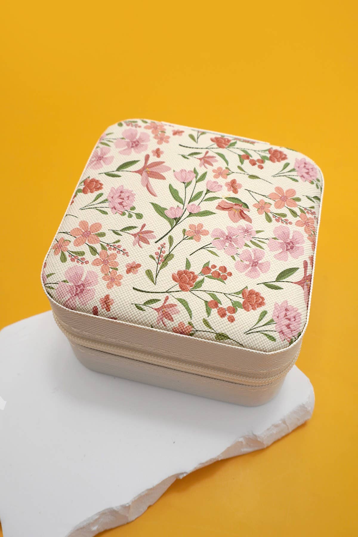 Square floral jewelry box with pink and orange flower pattern on yellow background