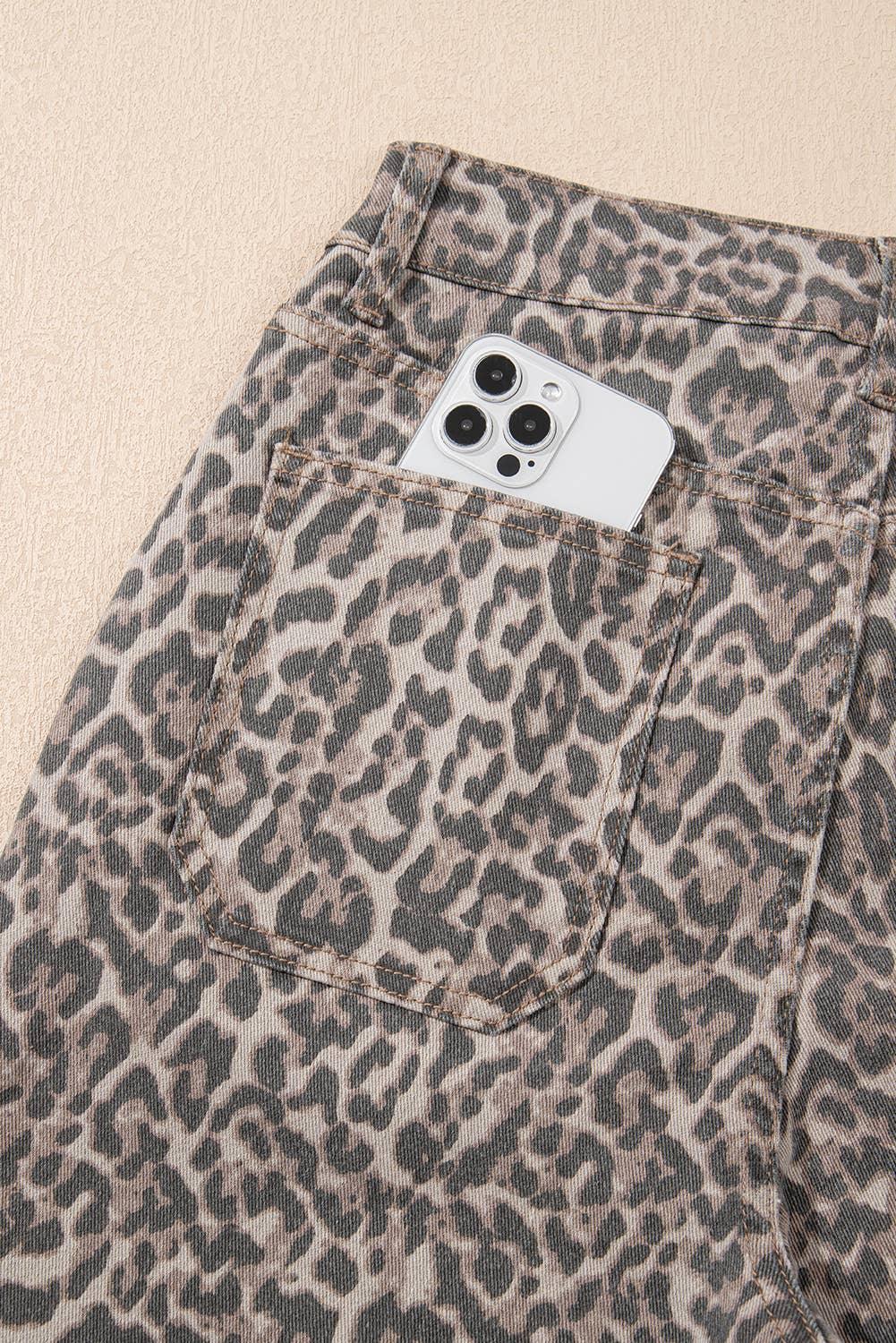 Leopard print jeans with phone in back pocket, stylish women's fashion