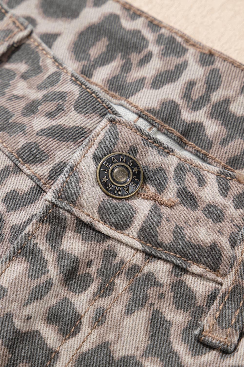 Leopard print denim jeans with branded button detail, stylish women's fashion