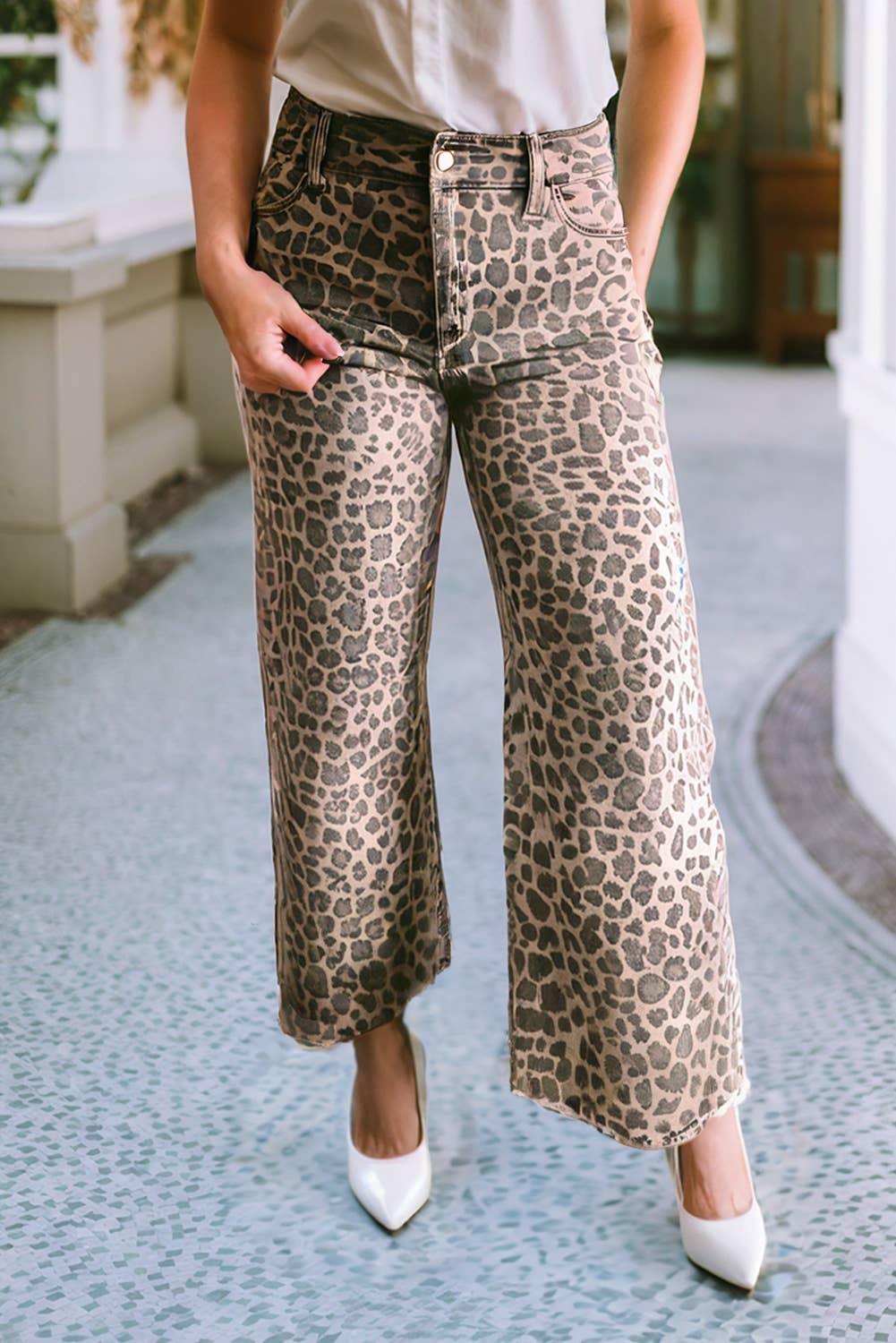Leopard print wide-leg pants with white heels, stylish women's fashion