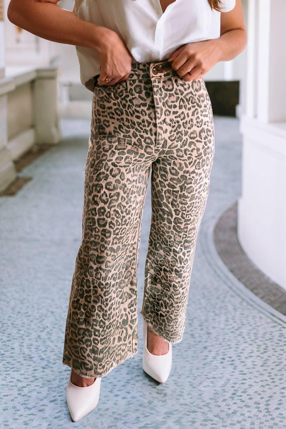Leopard print wide-leg pants with white blouse and pointed-toe heels, stylish women's fashion