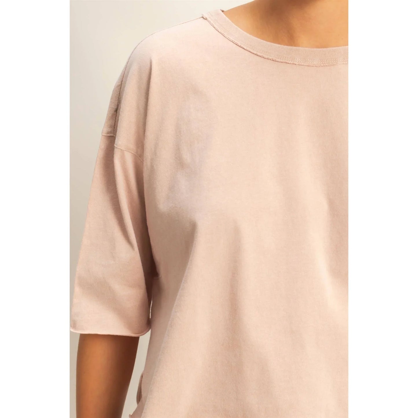 Soft blush oversized t-shirt with relaxed fit and crew neckline, ideal for casual fashion