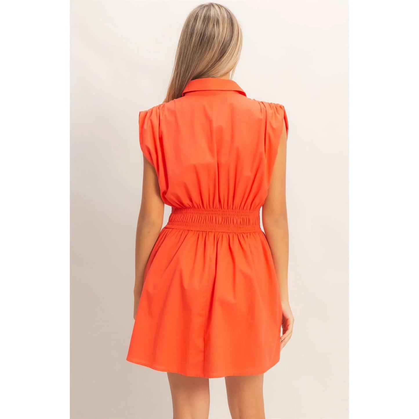 Vibrant orange sleeveless dress with collar and elastic waist, perfect for stylish summer outfits.