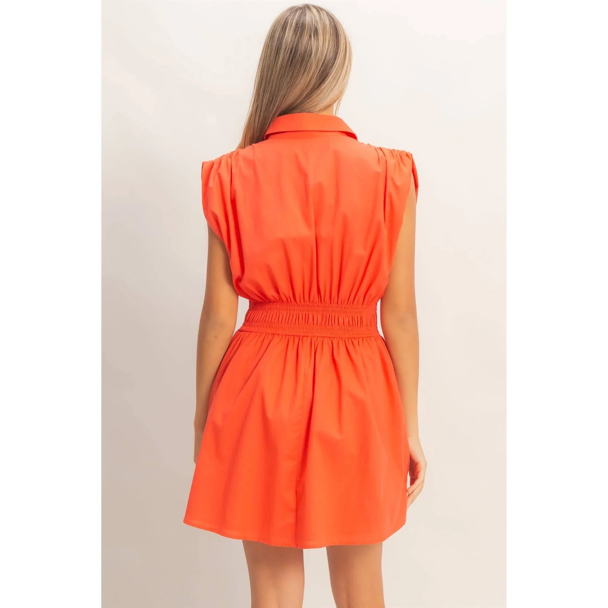 Vibrant orange sleeveless dress with collar and elastic waist, perfect for stylish summer outfits.